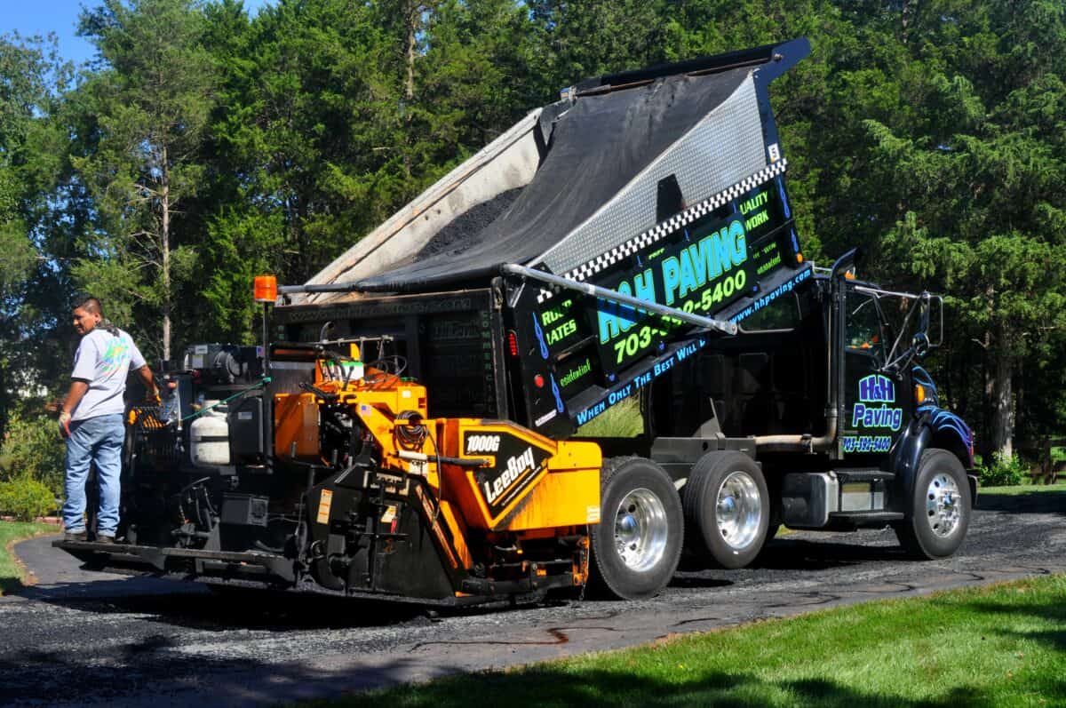Northern Virginia asphalt paving crew with equipment preparing a road surface